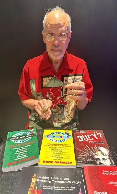 David Sklansky with his gold WSOP watches from the 1982 tournament