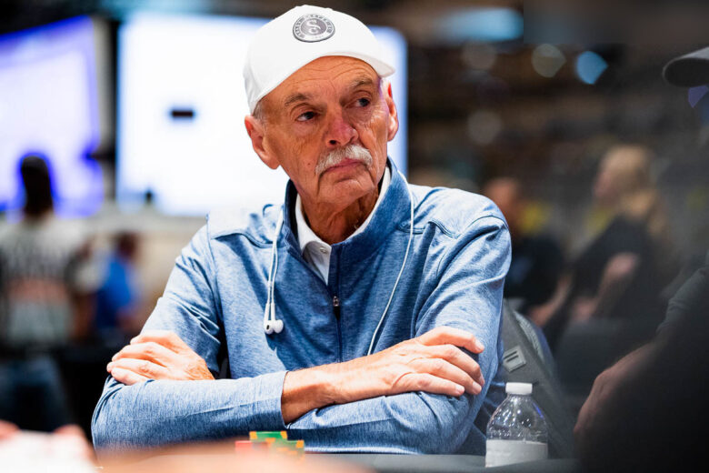 Bill Klein at a high-stakes poker table, focused and deep in thought as he calculates his next move.