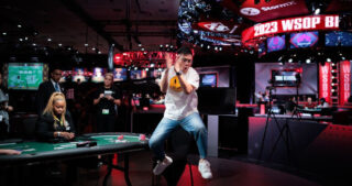 Pengfei Wang jumps for joy upon winning the bracelet